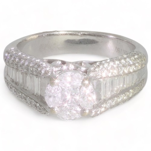 134 - A diamond set dress ring
1 stone, Princess cut. Colour: H/l. Clarity: VS2/SIl. (assessed) Length 3.0... 