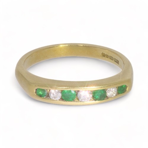 139 - A 18ct yellow gold diamond and emerald set half eternity ring
1 stone, Round brilliant cut. Colour: ... 