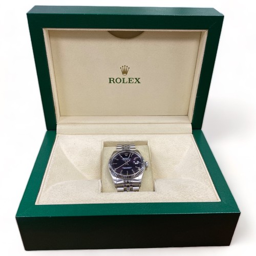 105 - ROLEX DATEJUST STEEL WATCH MENS PURPLE DIAL 36MM 18ct WHITE GOLD BEZEL 16014
Good condition, recentl... 