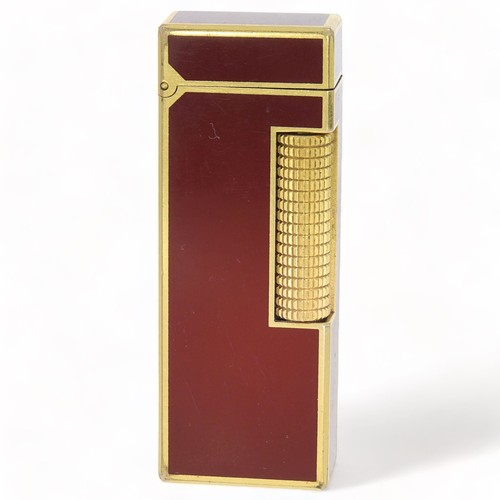 217 - Dunhill Lighter 24163 with a red design with box and papers