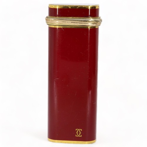 220 - Cartier red lighter 35877T