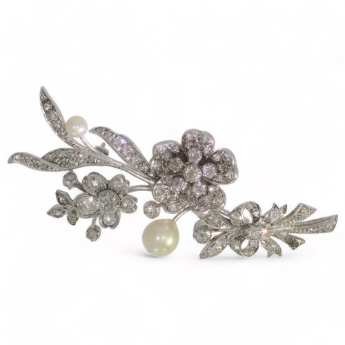 229 - A late 19th century diamond and pearl set spray brooch.
Old mine cut and rose cut diamonds approx. 1... 