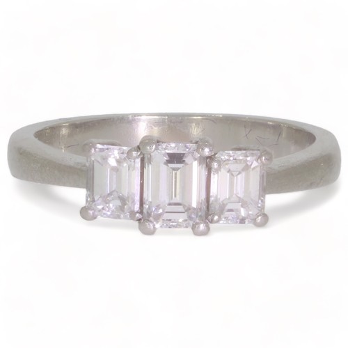 236 - Ladies three stone diamond set ring.
Emerald cut diamonds.
Graduating in size from the centre.
Centr... 