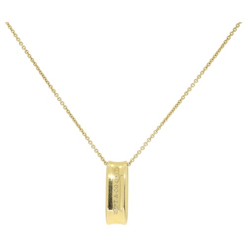 239 - Tiffany & Co. Loop 1837 Pendant in 18ct Yellow Gold
Creator: Tiffany & Co.
Metal: Yellow Gold,18k Go... 