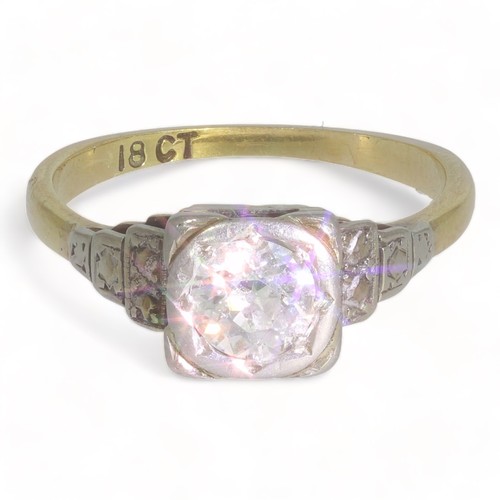 71 - An Early Twentieth century single stone diamond ring.
Old round European cut diamond weighing approx... 