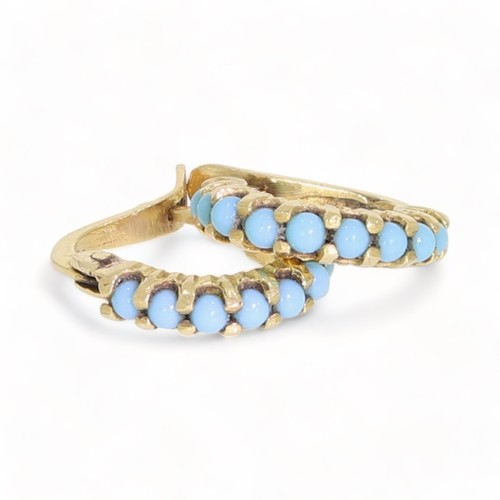 A pair of blue gem earrings. Length 1.3cms. 2.7gms.