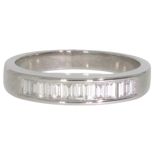 Platinum diamond half-eternity ring. Set withbaguette cut diamonds of 0 ...