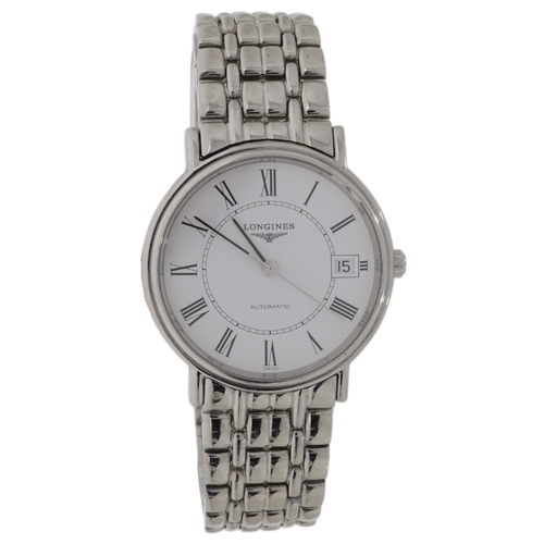 Longines Presence Automatic Watch Mens Stainless Steel Bracelet 36mm
Model Number L4.721.4
Dial: White Roman Numerals
Case: Stainless Steel 
Accessories: Box and papers and extra links 
Condition: Good (minor scratch’s on links)
Bracelet: Stainless Steel 
Case Diameter: 36mm