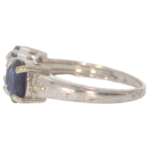 50 - 9ct gold diamond half eternity ring. Set three oval blue kyanite. Ring size N. Weight 3.59g. Hallmar... 