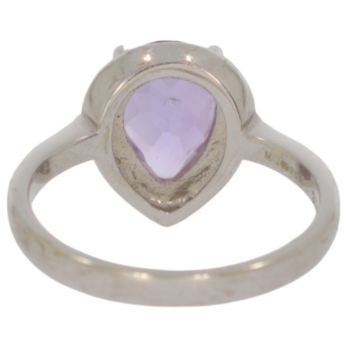 69 - 9ct white gold amethyst and diamond cluster ring. Set with one pear shape amethyst, and eight cut di... 