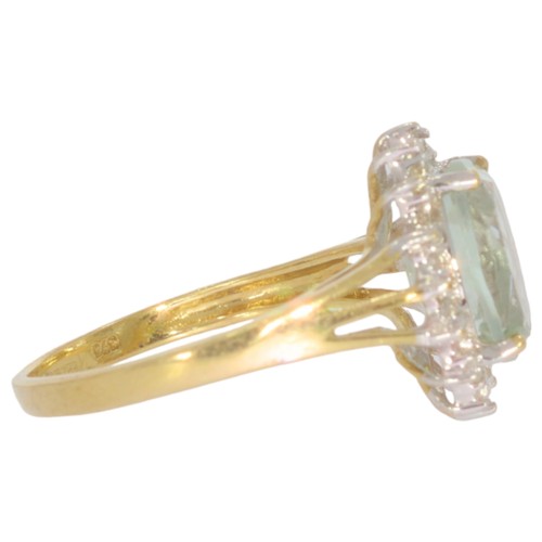 59 - 9ct gold green quartz and diamond cluster ring. Set with one oval green quartz, and eight cut diamon... 