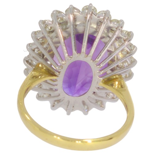 6 - 18ct gold amethyst and diamond cluster ring.Set with a vibrant violet amethyst measuring 20x14mm, an... 