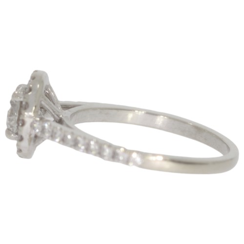 166 - Diamond halo cluster ring. Set with a principle brilliant cut diamond of 0.67ct calculated weight, a... 