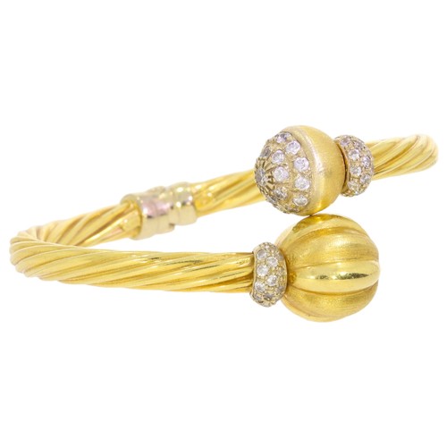 303 - Yellow Gold Marked '750' And CZ Bangle 47 CZ's Twisted Design 21.3 Grams