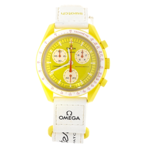 100 - Omega Swatch Mission To The Sun 
42mm 
Bio ceramic 
Quartz 
Yellow Dial 
Box And Papers