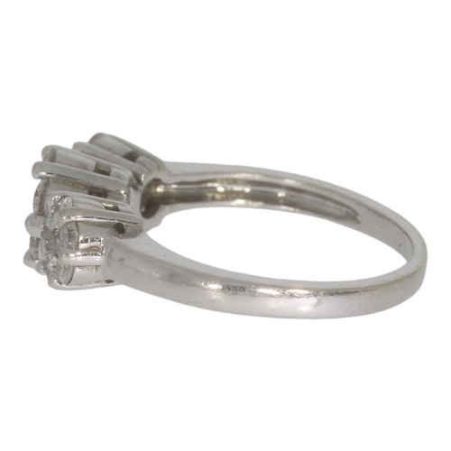 97 - A diamond cluster ring. Set with brilliant cut diamonds of 1.00ct total calculated weight, assessed ... 