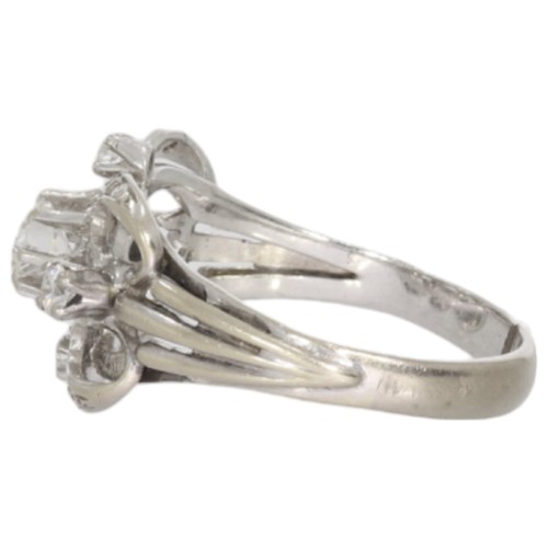 103 - A Diamond Set Dress Ring.
The Ring Mount Has Been Assessed As 18ct White Gold. 
1 Stone, Round Brill... 