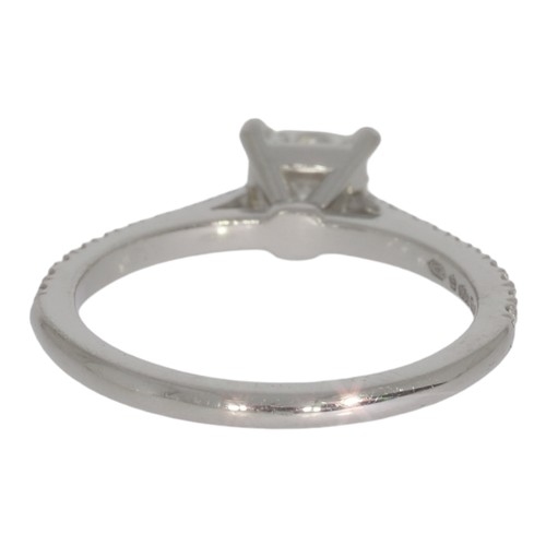 146 - Platinum diamond single-stone ring, with diamond shoulders.  Set with a principle radiant cut diamon... 