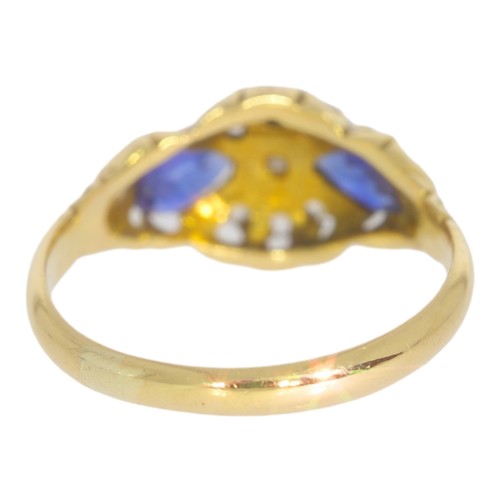 125 - Antique 18ct gold sapphire and diamond dress ring. Set with two medium blue sapphires, and rose cut ... 