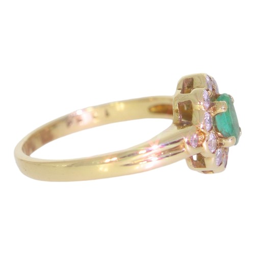 58 - 9ct gold emerald and diamond cluster ring. Set with an oval cut emerald, and brilliant cut diamonds ... 