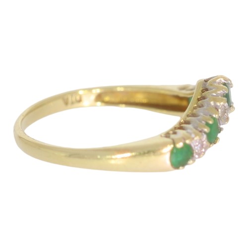 59 - 9ct gold emerald and diamond wishbone half-eternity ring. Set with round emeralds, and eight cut dia... 