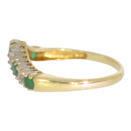 59 - 9ct gold emerald and diamond wishbone half-eternity ring. Set with round emeralds, and eight cut dia... 