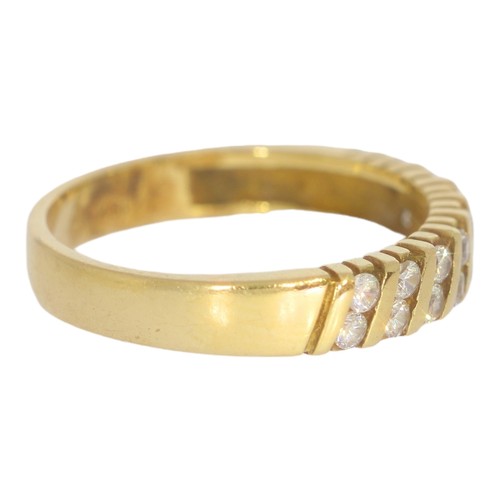 37 - 18ct yellow gold and diamond band. 
size M
16x small dias.