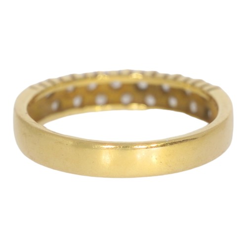 37 - 18ct yellow gold and diamond band. 
size M
16x small dias.