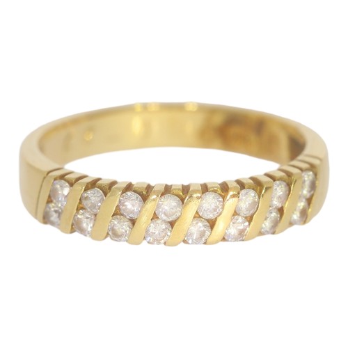 37 - 18ct yellow gold and diamond band. 
size M
16x small dias.