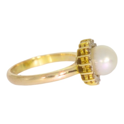 94 - A cultured pearl and diamond cluster ring.  Set with a cultured pearl and brilliant cut diamonds of ... 