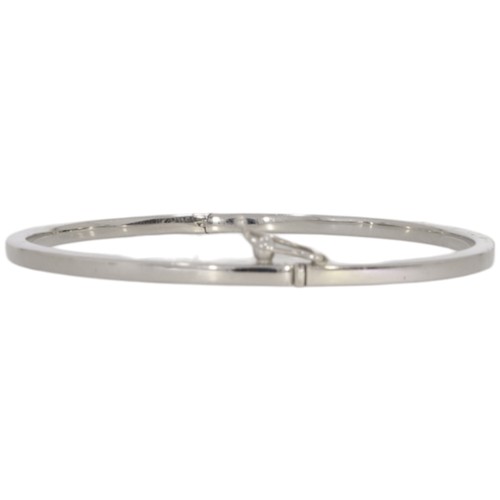 34 - 18ct White gold hinged bangle. plain.