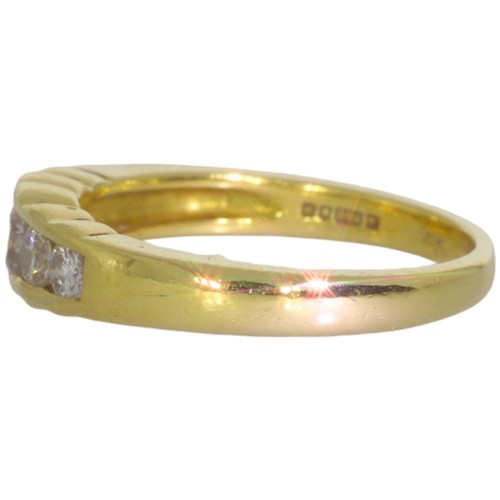 118 - An 18ct gold diamond half-eternity ring. Set with brilliant cut diamonds of 0.80ct total calculated ... 