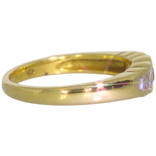 118 - An 18ct gold diamond half-eternity ring. Set with brilliant cut diamonds of 0.80ct total calculated ... 