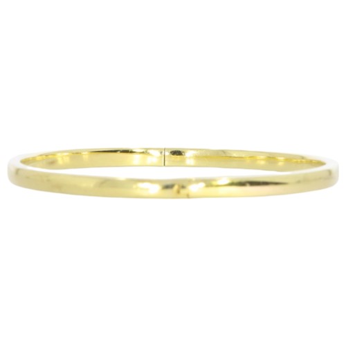 86 - 9ct yellow gold hollow hinged bangle.