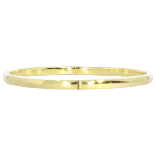 86 - 9ct yellow gold hollow hinged bangle.