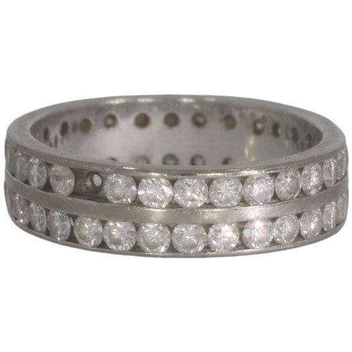 121 - An 18ct white gold diamond full eternity ring. Set with brilliant cut diamonds of 3.08ct total calcu... 