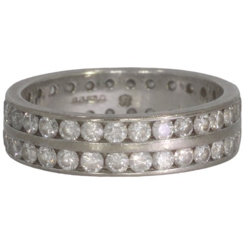 121 - An 18ct white gold diamond full eternity ring. Set with brilliant cut diamonds of 3.08ct total calcu... 