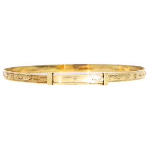 85 - 9ct yellow gold expandable baby bangle.