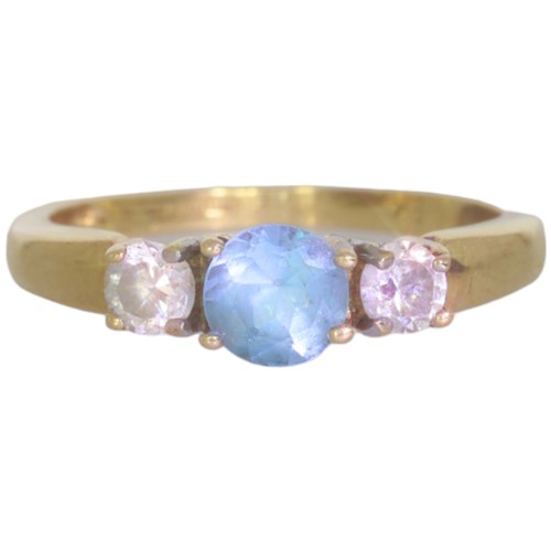 65 - 9ct gold topaz and CZ three stone ring. Set with an oval cut blue topaz, and CZ. Size M. Weight 2.2g... 