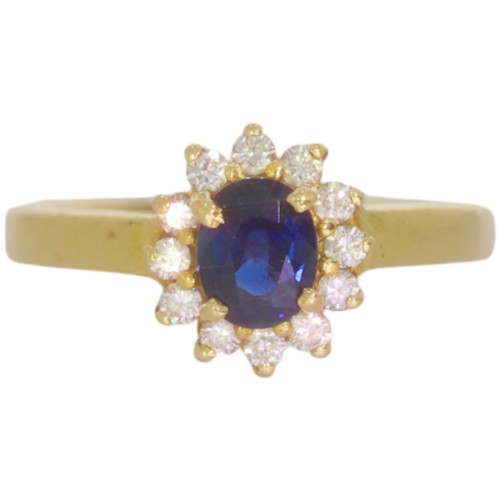 62 - 9ct gold sapphire and CZ ring. Set with an oval sapphire and CZ. Size J .Weight 2g. Tested as 9ct go... 