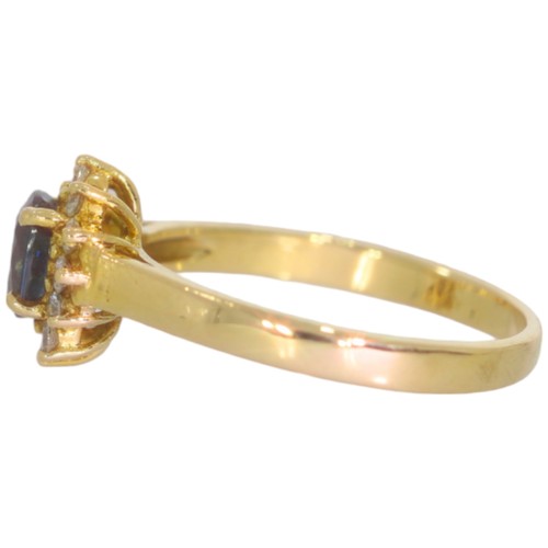 62 - 9ct gold sapphire and CZ ring. Set with an oval sapphire and CZ. Size J .Weight 2g. Tested as 9ct go... 