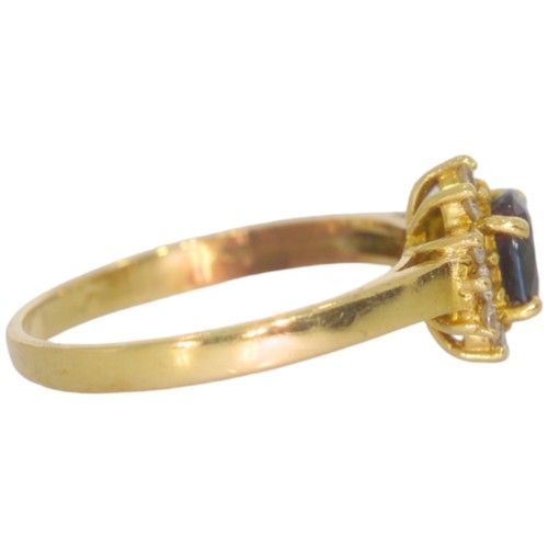 62 - 9ct gold sapphire and CZ ring. Set with an oval sapphire and CZ. Size J .Weight 2g. Tested as 9ct go... 