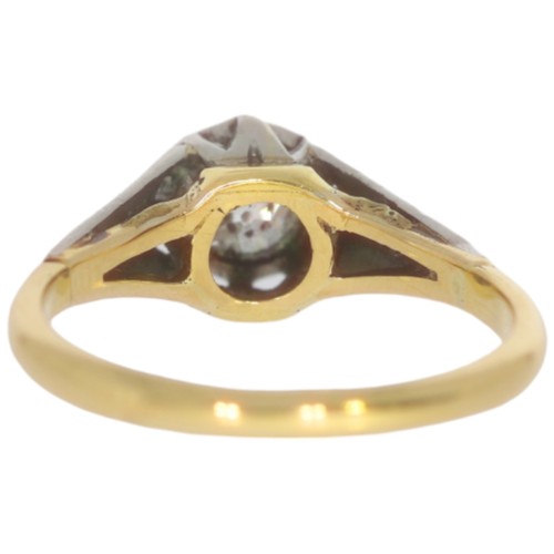 110 - A mid-twentieth century 18ct gold diamond three stone ring. Set with a principle old European cut di... 