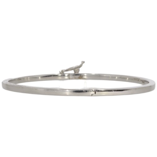 34 - 18ct White gold hinged bangle. plain.