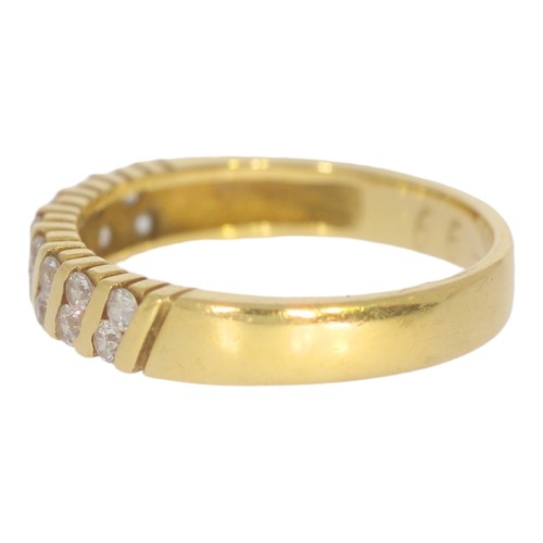 37 - 18ct yellow gold and diamond band. 
size M
16x small dias.