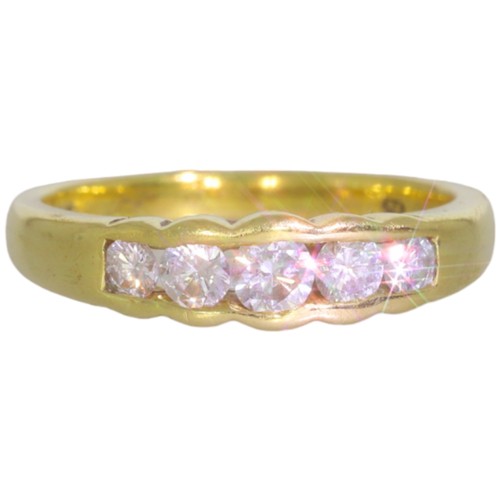 118 - An 18ct gold diamond half-eternity ring. Set with brilliant cut diamonds of 0.80ct total calculated ... 