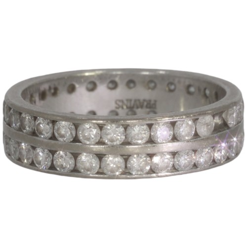 121 - An 18ct white gold diamond full eternity ring. Set with brilliant cut diamonds of 3.08ct total calcu... 