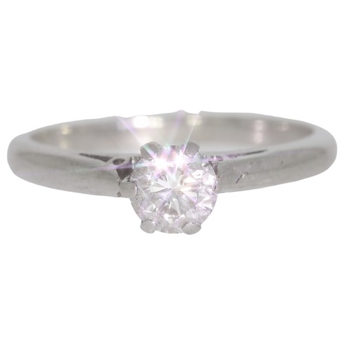 148 - Platinum diamond single-stone ring. Set with a brilliant cut diamond of 0.60ct calculated weight, as... 