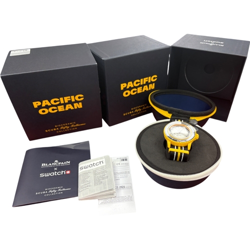 13 - Blancpain X Swatch PACIFIC OCEAN SO35P100C  Case material: yellow-orange Bioceramic case including c... 