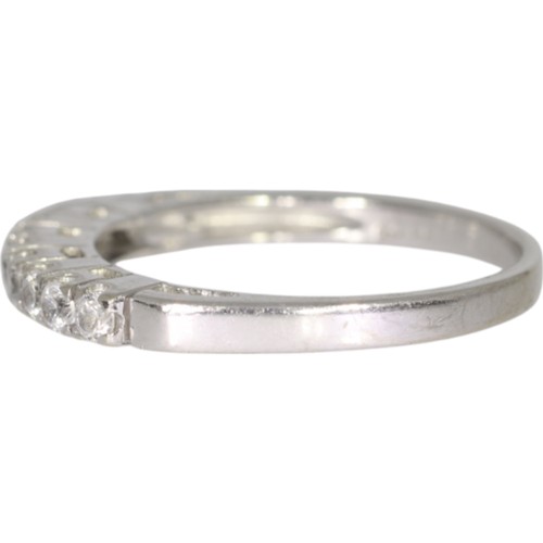 114 - 14ct white gold CZ half eternity ring. Size N. Weight 2.6g. Stamped 585 and tested as 14ct gold and ... 